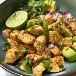 Juicy Aguacate con Pollo showcasing fresh avocado cubes and cooked chicken.