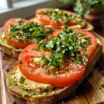 ['Tostadas de aguacate y hummus con rodajas de tomate.', 'Close up de tostadas de pan integral con hummus y aguacate.', 'Detalle de tostadas con hummus, aguacate y especias.', 'Aperitivo de tostadas de aguacate y hummus adornadas con orégano.']