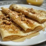Crepes de requesón y nueces recién preparados.